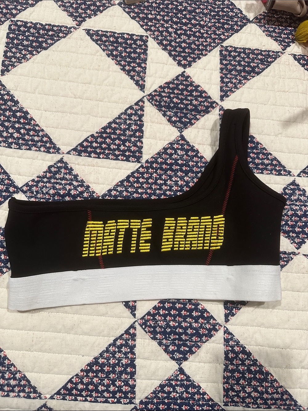 One-Shoulder Crop Top in Black with Yellow Logo